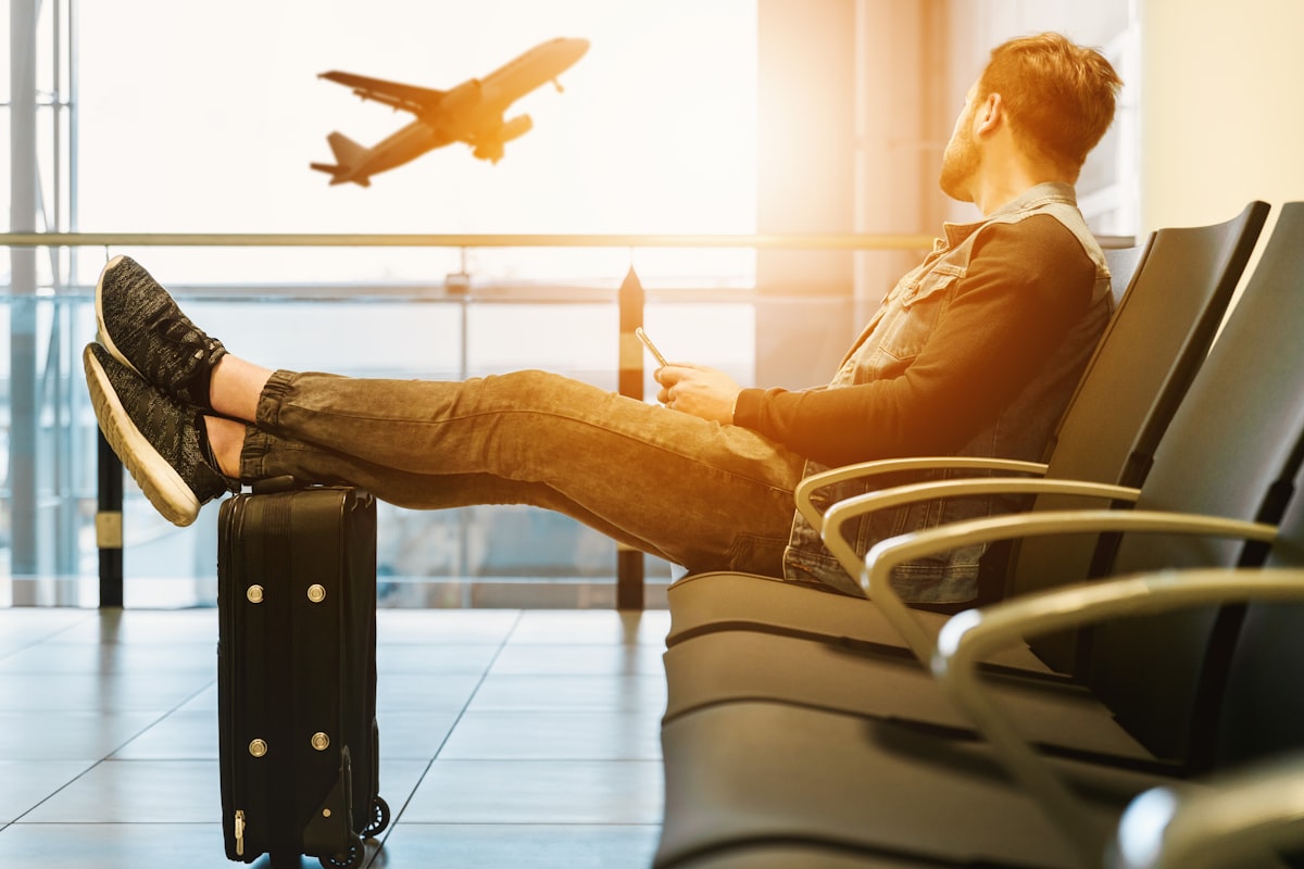 Traveller at airport with passport